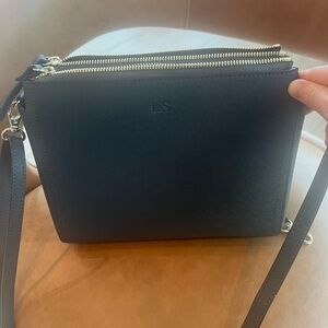 stylish, leather crossbody bag leather that converts to a shoulder bag/clutch